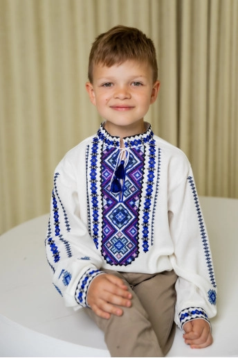 Вишиванка для хлопчика Русланчик ( молочний з синім) – купити в Україні від Галичанка